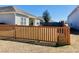 Backyard featuring a well-maintained lawn, and a stylish wooden fence for added privacy and appeal at 113 Mayfield Dr, Goose Creek, SC 29445