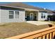 Backyard area featuring a patio, well-maintained lawn, and a partial view of the home's exterior at 113 Mayfield Dr, Goose Creek, SC 29445
