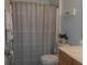 Neutral colored bathroom with shower and bathtub with updated fixtures and decorative touches at 113 Mayfield Dr, Goose Creek, SC 29445