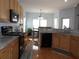 Well-equipped kitchen with stainless steel appliances, granite countertops, and ample cabinet space at 113 Mayfield Dr, Goose Creek, SC 29445