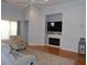 Bright living room with a fireplace, TV, neutral decor, and comfortable seating at 113 Mayfield Dr, Goose Creek, SC 29445