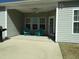 Relaxing covered patio featuring a ceiling fan and outdoor seating at 113 Mayfield Dr, Goose Creek, SC 29445