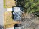 Aerial view of a well-maintained home with a classic roof, mature trees, and a driveway at 116 Lyle Rd, Goose Creek, SC 29445