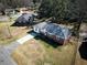 Aerial view of a home with a well-maintained yard and long driveway at 116 Lyle Rd, Goose Creek, SC 29445