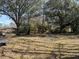 Expansive backyard surrounded by mature trees, offering a private outdoor space at 116 Lyle Rd, Goose Creek, SC 29445