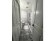 Bathroom showcasing a glass shower, a black and white patterned floor, and a modern vanity at 116 Lyle Rd, Goose Creek, SC 29445