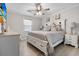 Neutral bedroom features stylish furniture, decor and fan with light at 116 Lyle Rd, Goose Creek, SC 29445