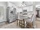Bright kitchen with stainless steel appliances, a kitchen island with bar seating, and recessed lighting at 116 Lyle Rd, Goose Creek, SC 29445