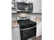 Whirlpool stainless steel range and oven, stainless steel microwave and granite countertops in kitchen at 116 Lyle Rd, Goose Creek, SC 29445
