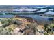 A waterfront property featuring a cozy home on a sprawling lot with river access and mature trees at 1302 Mccrae Dr Dr, Moncks Corner, SC 29461