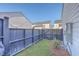 Fenced backyard featuring a small patch of grass and a wooden fence at 131 Summer Tanager Dr, Ravenel, SC 29470