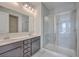 Bathroom featuring double vanity, modern fixtures, and a glass-enclosed shower at 131 Summer Tanager Dr, Ravenel, SC 29470
