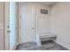 Functional entryway with a built-in bench and coat rack for added convenience at 131 Summer Tanager Dr, Ravenel, SC 29470