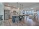 Modern kitchen with stainless steel appliances, granite countertops, and an island with bar seating at 131 Summer Tanager Dr, Ravenel, SC 29470