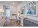 Bright office space with a work desk, stylish chair, and decorative artwork at 131 Summer Tanager Dr, Ravenel, SC 29470