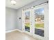 Bright dining area with tiled floors and outdoor patio access through glass doors at 141 Cannon Ave, Goose Creek, SC 29445