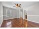 Bedroom showcasing hardwood floors, ceiling fan, and an attached bathroom at 144 Clark Ln, Summerville, SC 29483