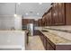Gourmet kitchen showcasing granite countertops, stainless steel appliances, and breakfast bar at 144 Clark Ln, Summerville, SC 29483