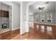 Spacious living room with hardwood floors and large windows, providing ample natural light at 144 Clark Ln, Summerville, SC 29483