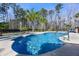 Inviting backyard pool surrounded by lush landscaping and privacy fencing at 144 Clark Ln, Summerville, SC 29483