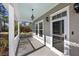 Charming front porch with painted ceiling, perfect for enjoying outdoor space at 144 Clark Ln, Summerville, SC 29483
