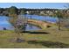 Picturesque view of the pond and lush greenery in the backyard at 1523 Star Flower Aly, Johns Island, SC 29455