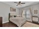 Comfortable bedroom featuring a ceiling fan, natural light, and hardwood floors at 1523 Star Flower Aly, Johns Island, SC 29455