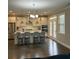 Modern kitchen featuring island with seating, stainless appliances, and white cabinetry at 1601 Secessionville Rd, Charleston, SC 29412