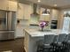 Gourmet kitchen featuring island with seating, stainless appliances, and stylish range hood at 1601 Secessionville Rd, Charleston, SC 29412