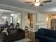 Spacious living room with open floor plan and a view of the staircase at 1601 Secessionville Rd, Charleston, SC 29412