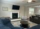Cozy living room with a fireplace and a large sectional sofa at 1601 Secessionville Rd, Charleston, SC 29412