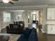Open floor plan featuring living room and view into dining area and front entry at 1601 Secessionville Rd, Charleston, SC 29412