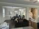 Open floor plan featuring living room, dining area, and staircase at 1601 Secessionville Rd, Charleston, SC 29412