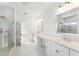 Bright bathroom featuring double sinks, a long vanity, and a spacious glass-enclosed shower at 1738 Cultivation Ln # 532, Mount Pleasant, SC 29466