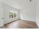 Bright bedroom with hardwood floors and a window at 1738 Cultivation Ln # 532, Mount Pleasant, SC 29466