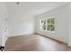 Well lit room with hardwood floors and white trim, window, and closet at 1738 Cultivation Ln # 532, Mount Pleasant, SC 29466