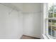 A closet with a window and built-in shelving for optimal organization at 1738 Cultivation Ln # 532, Mount Pleasant, SC 29466