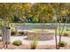 Outdoor fire pit with seating area in a landscaped garden at 1738 Cultivation Ln # 532, Mount Pleasant, SC 29466