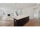 Open-concept kitchen with hardwood flooring, stainless appliances, and an island perfect for cooking and entertaining at 1738 Cultivation Ln # 532, Mount Pleasant, SC 29466