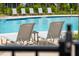 Lounge chairs by the community pool at 1738 Cultivation Ln # 532, Mount Pleasant, SC 29466