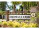Liberty Hill Farms community entrance sign with beautiful landscaping at 1738 Cultivation Ln # 532, Mount Pleasant, SC 29466