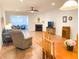 Spacious living room features a fireplace, hardwood flooring, ceiling fan, and comfortable furniture for relaxation at 2117 Colson Ln, Johns Island, SC 29455