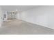 Large, clean garage featuring an automatic door, electrical panel, and concrete floor at 2193 Helm Ave, North Charleston, SC 29405