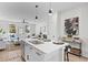 Contemporary kitchen view featuring an island, stainless appliances, and an open design to the living area at 2193 Helm Ave, North Charleston, SC 29405