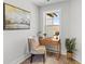 Bright and airy office space with natural light, desk, and a view from the window at 2193 Helm Ave, North Charleston, SC 29405