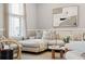 Inviting living room featuring a comfortable sectional sofa, accent chairs, and stylish decor at 231 Abercom Place Dr, Moncks Corner, SC 29461