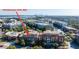 Aerial view of Penthouse Unit 303, showcasing the neighborhood and surrounding waterfront landscape at 245 Seven Farms Dr # 330, Charleston, SC 29492