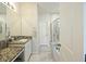 Bright bathroom featuring a granite countertop vanity, a toilet, and a glass-enclosed shower at 310 Silent Bluff Dr, Summerville, SC 29486