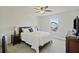 Well-lit bedroom features a large window, bedside tables, and a comfortable bed at 310 Silent Bluff Dr, Summerville, SC 29486
