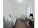 Bright office space with hardwood floors, daybed, accent chair, and desk at 310 Silent Bluff Dr, Summerville, SC 29486
